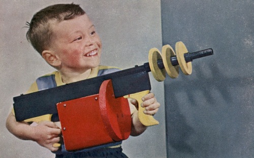 boy-playing-with-toy-gun.jpg